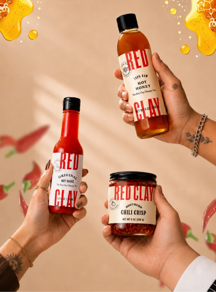 Hands holding Original Hot Sauce, Hot Honey and Southern Chili Crisp